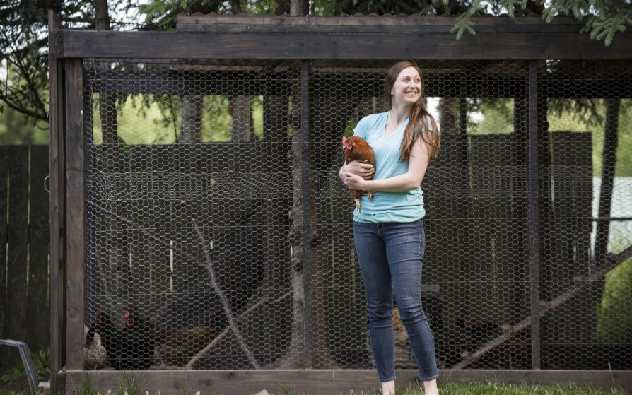 Ashley with Rhode Island Red hen