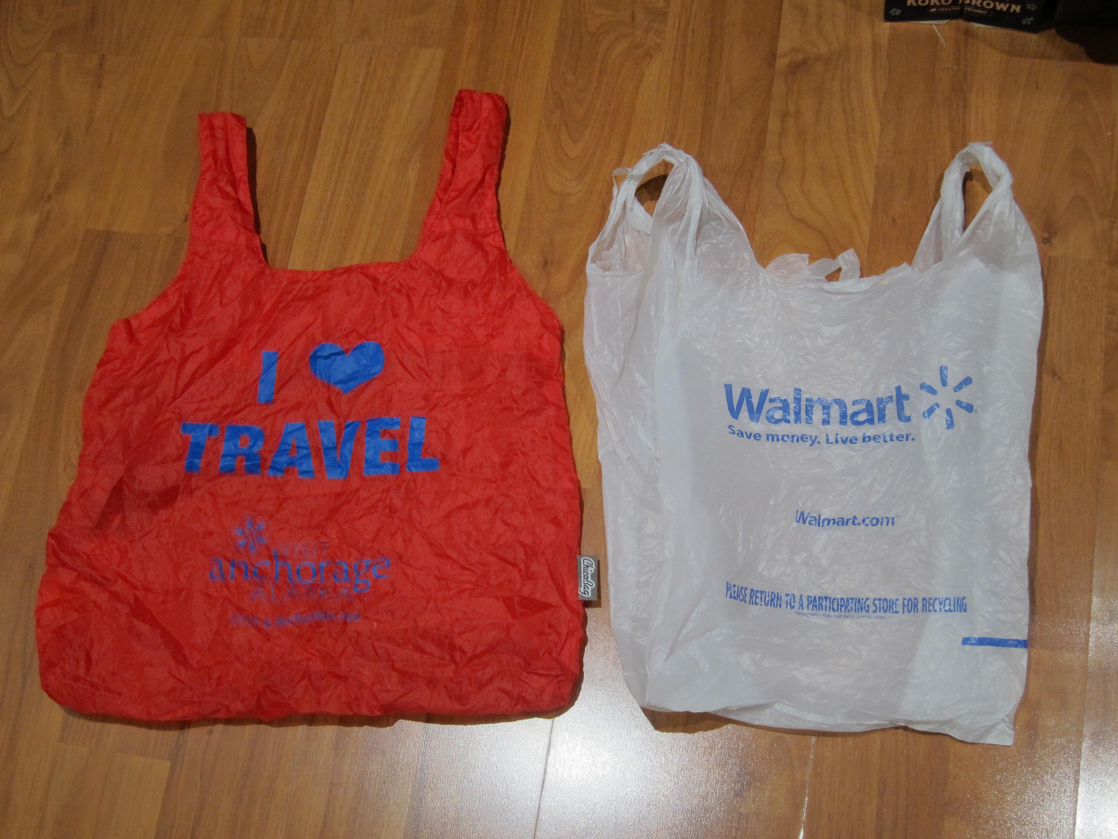 reusable bag next to a Walmart bag