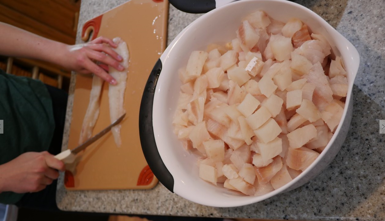 dicing raw halibut filets