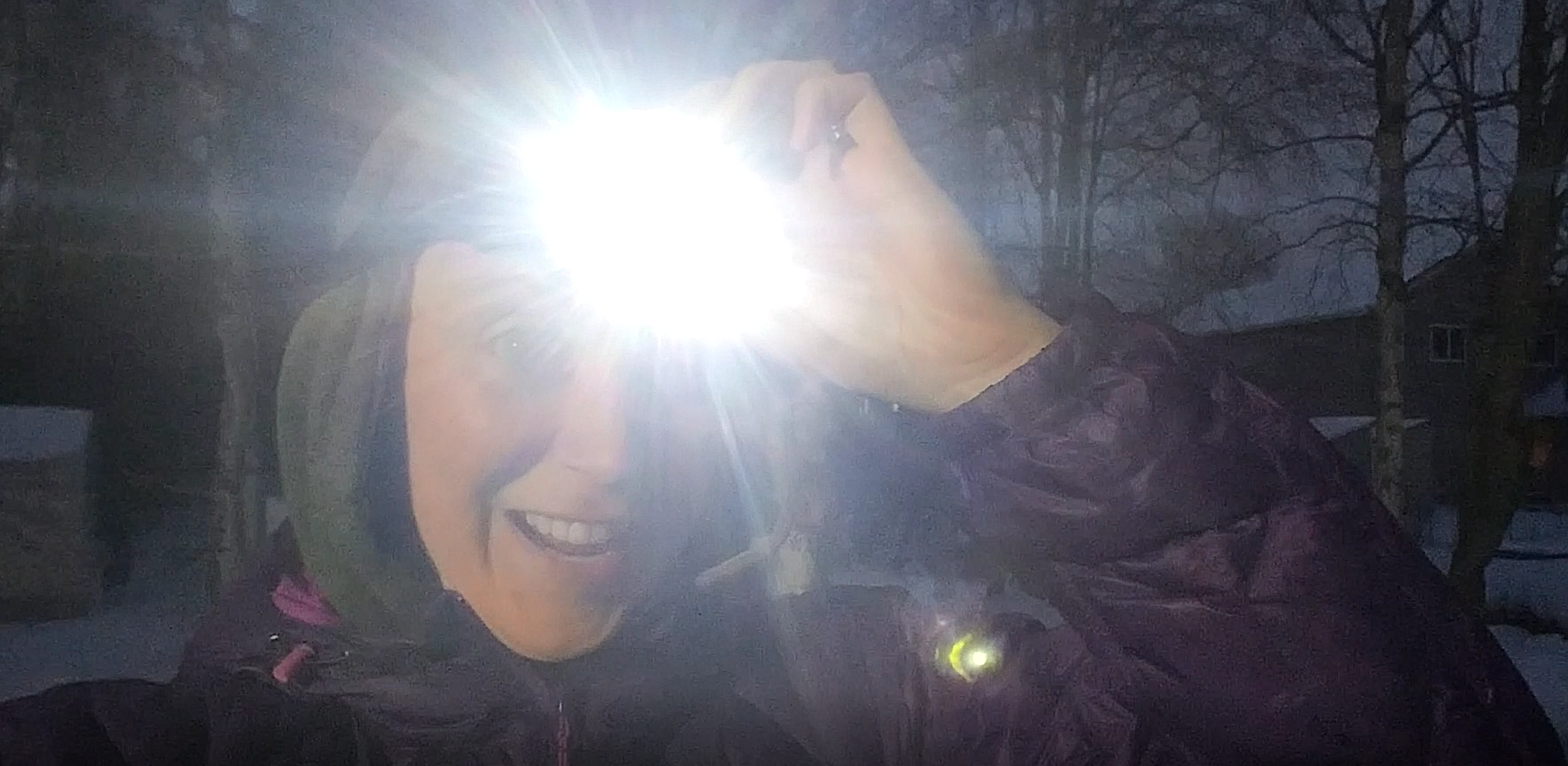 Ashley Taborsky with headlamp in winter